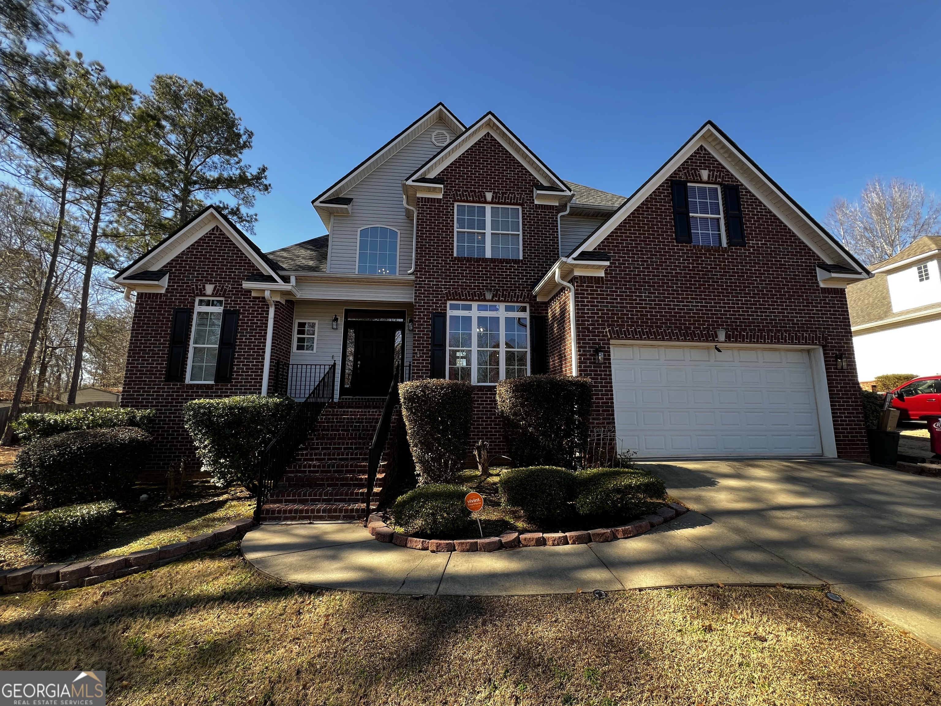 1104 Boulder Drive Gray, GA 31032 - Photo 1 of 81 a front view of a house with yard and parking