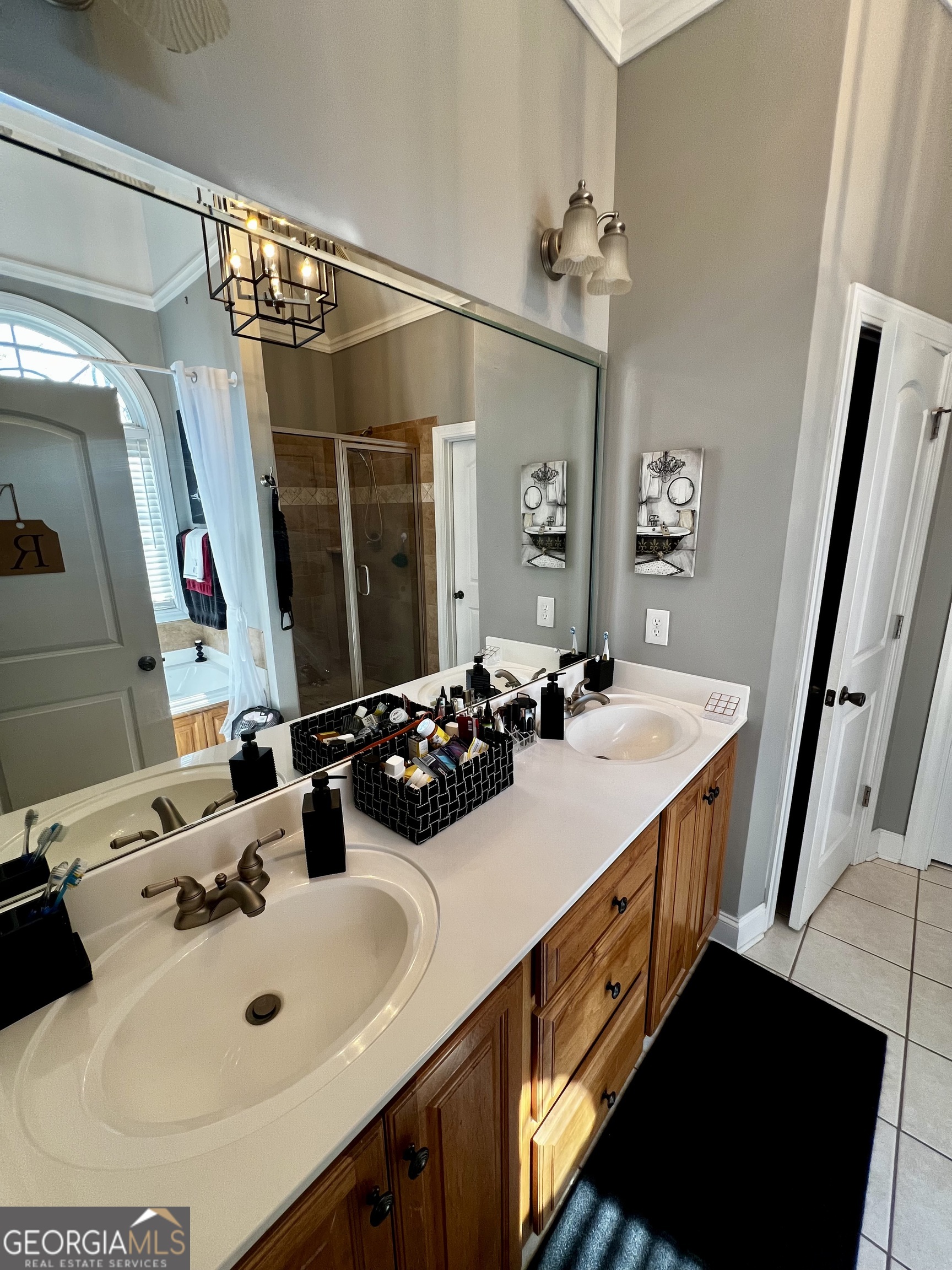 1104 Boulder Drive Gray, GA 31032 - Photo 38 of 81 a bathroom with a double vanity sink a mirror and shower