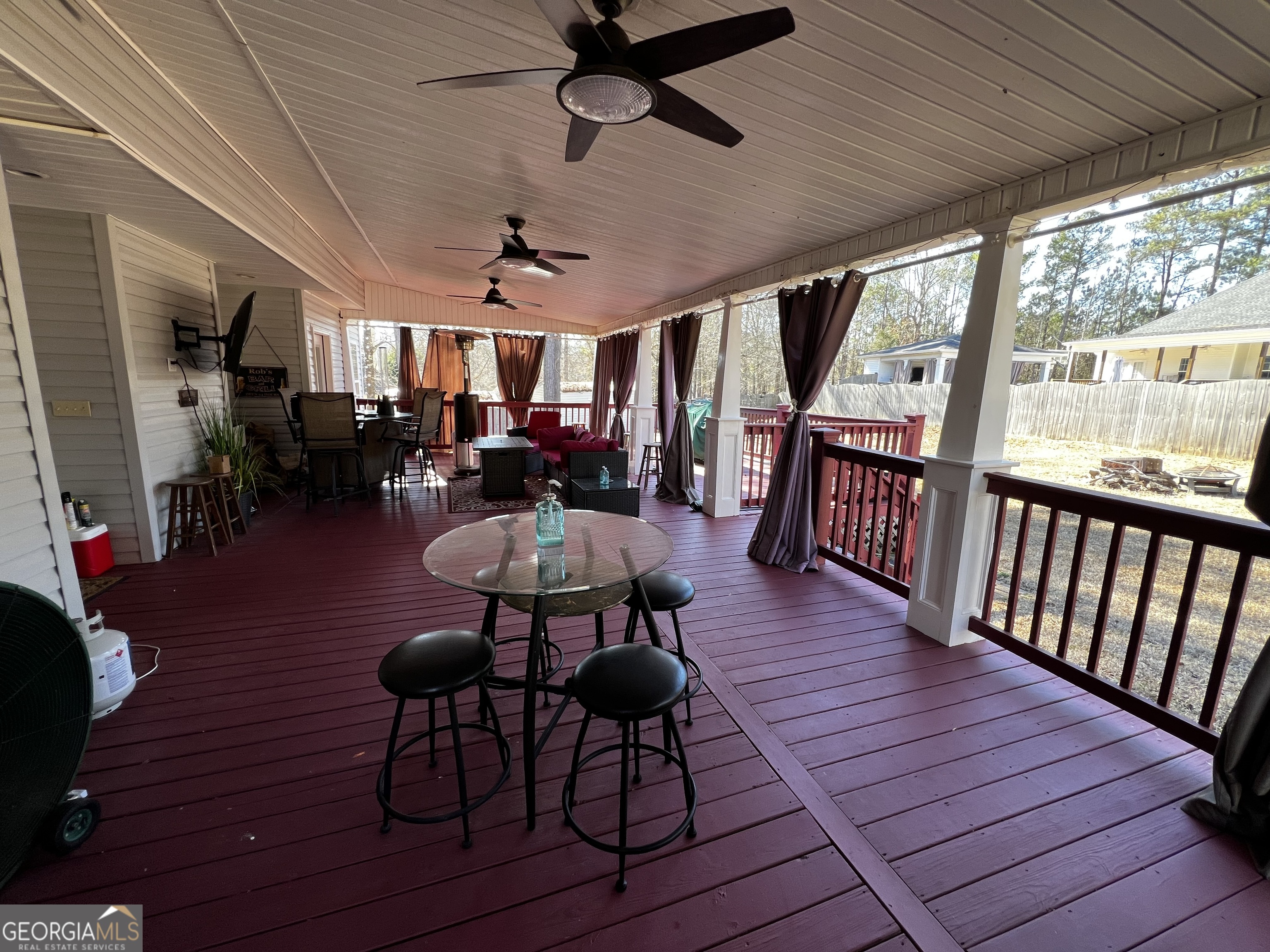 1104 Boulder Drive Gray, GA 31032 - Photo 67 of 81 a view of a dining room with furniture window and wooden floor
