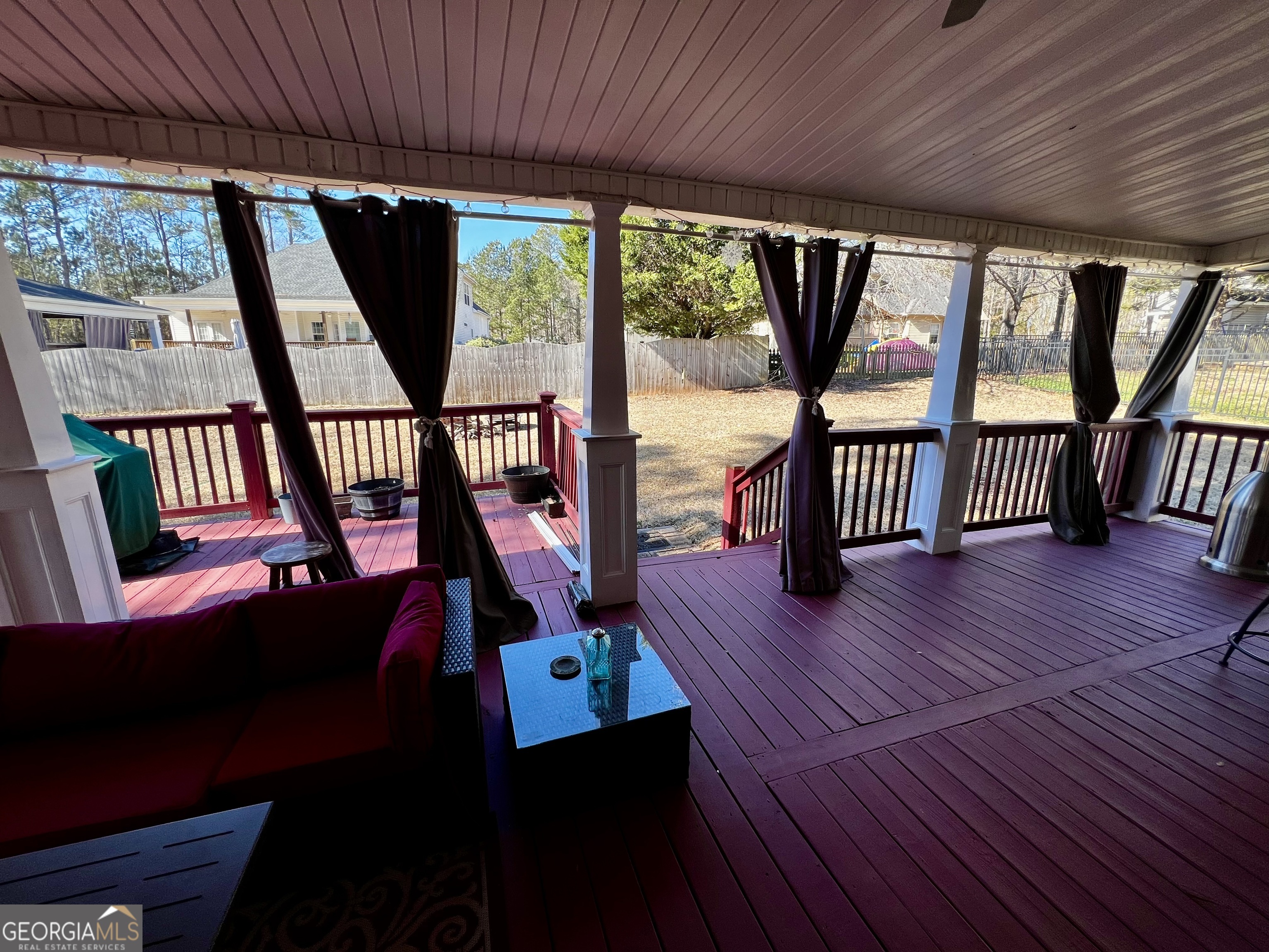 1104 Boulder Drive Gray, GA 31032 - Photo 71 of 81 a view of a balcony with chairs and wooden floor