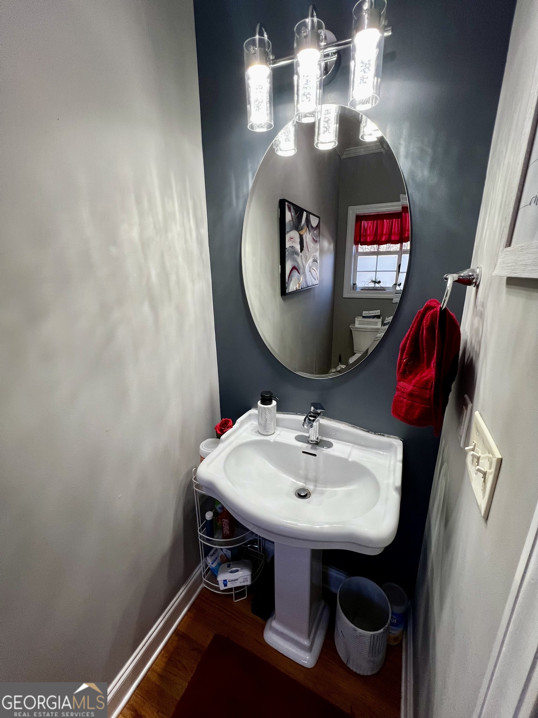 1104 Boulder Drive Gray, GA 31032 - Photo 8 of 81 a bathroom with a sink and a mirror