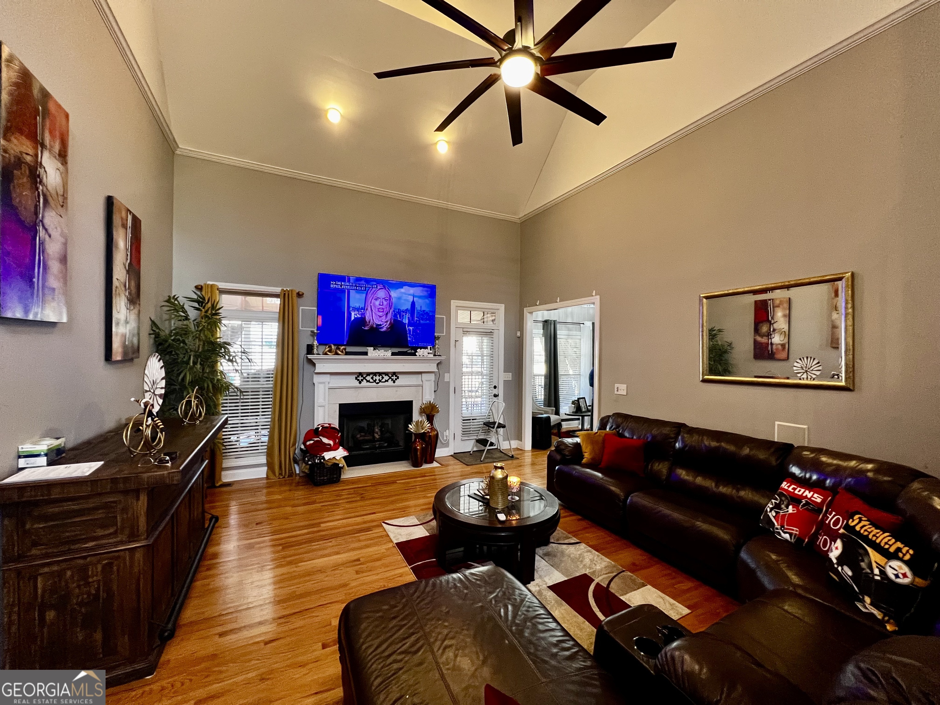 1104 Boulder Drive Gray, GA 31032 - Photo 9 of 81 a living room with furniture fireplace and flat screen tv