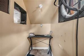 214 Brownsville Road Pittsburgh, PA 15210 - Photo 11 of 29 a picture of a bathroom with a sink and a mirror
