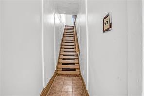 214 Brownsville Road Pittsburgh, PA 15210 - Photo 12 of 29 a view of a hallway with stairs