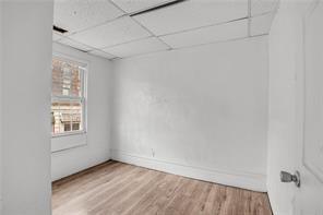 214 Brownsville Road Pittsburgh, PA 15210 - Photo 23 of 29 a view of an empty room with a window