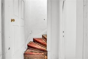 214 Brownsville Road Pittsburgh, PA 15210 - Photo 24 of 29 a view of room with wooden floor