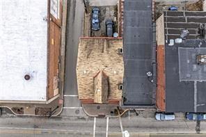 214 Brownsville Road Pittsburgh, PA 15210 - Photo 4 of 29 a view of a door with a tree