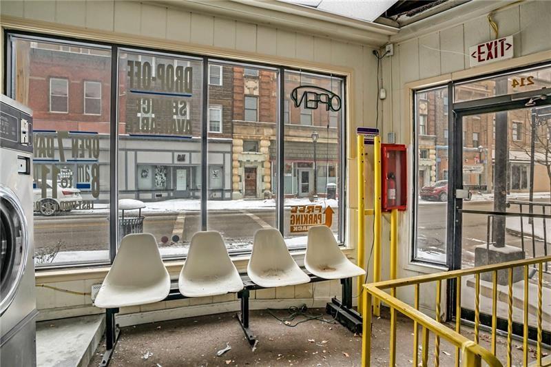 214 Brownsville Road Pittsburgh, PA 15210 - Photo 7 of 29 a front view of a building with outdoor seating