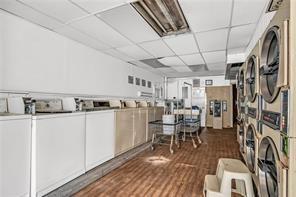 214 Brownsville Road Pittsburgh, PA 15210 - Photo 9 of 29 a living room with lots of furniture and white walls