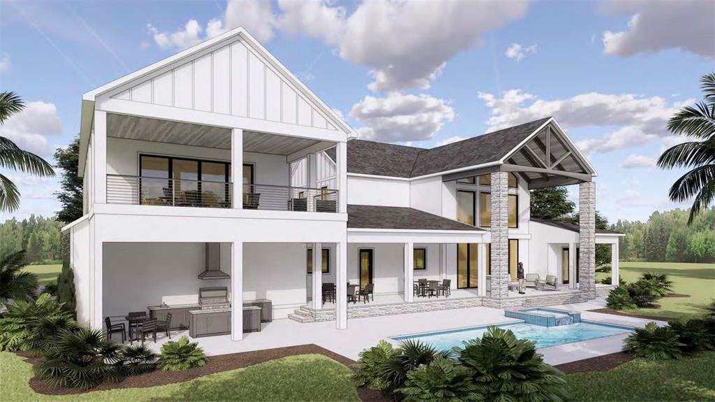 655 Appaloosa Road Tarpon Springs, FL 34688 - Photo 4 of 12 a front view of a house with garden