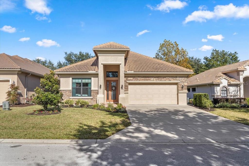1601 West Laurel Glen Path Hernando, FL 34442 - Photo 1 of 1 a front view of a house with a yard