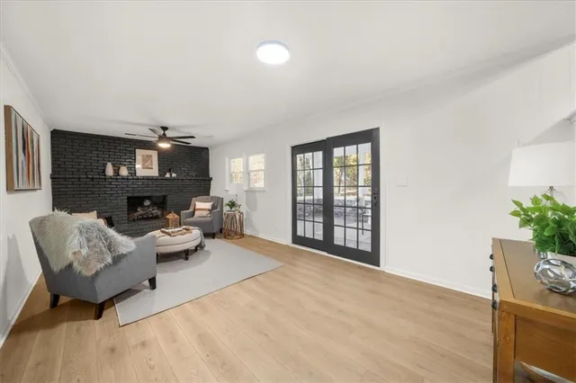 a bathroom with a toilet sink vanity and mirror