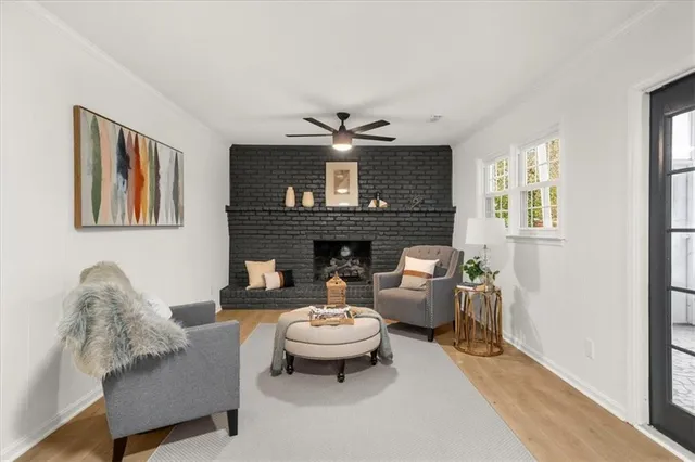 a view of an empty room with closet and bathroom