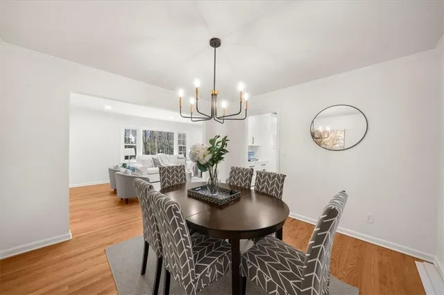 a kitchen with stainless steel appliances a refrigerator stove microwave and cabinets