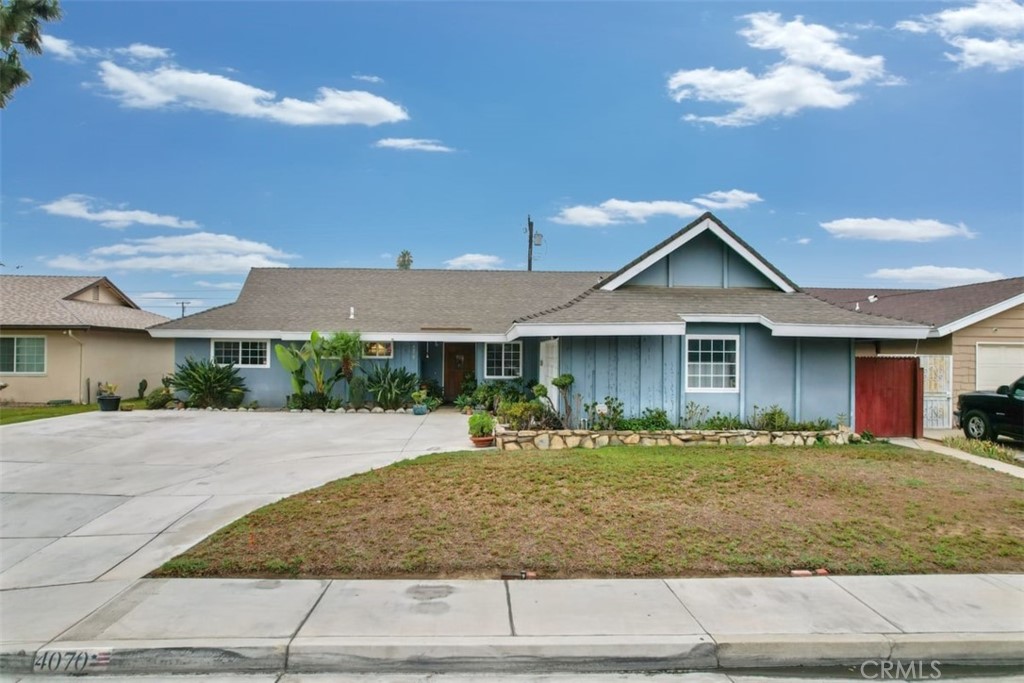 4070 Polk Street Riverside, CA 92505 - Photo 1 of 1 a front view of a house with garden
