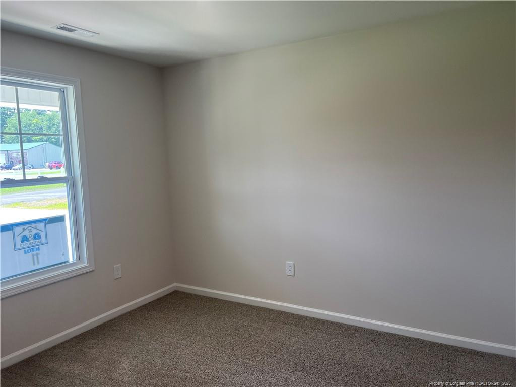 92 Dalton Drive Benson, NC 27504 - Photo 14 of 19 a room that has a window