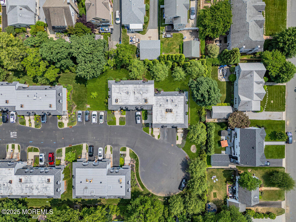 65 East River Road, Unit 28 Rumson, NJ 07760 - Photo 41 of 43 an aerial view of residential houses with outdoor space