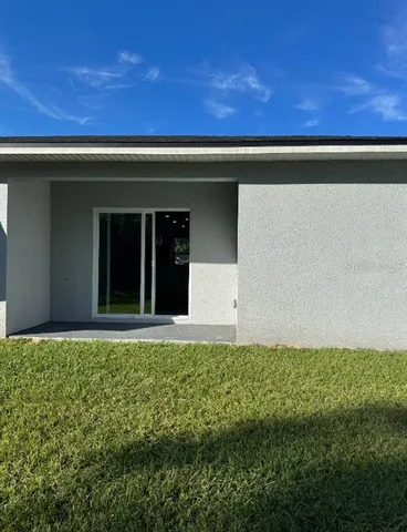 a view of backyard with window