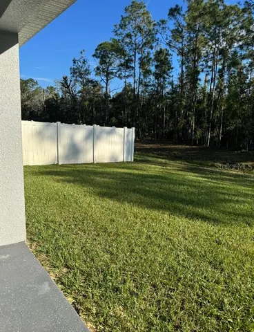 a view of a green yard