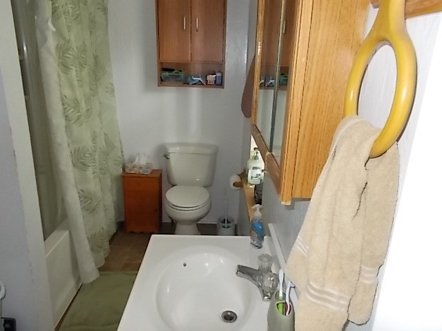 720 Grove Street Emlenton, PA 16373 - Photo 12 of 18 a bathroom with a sink and a mirror