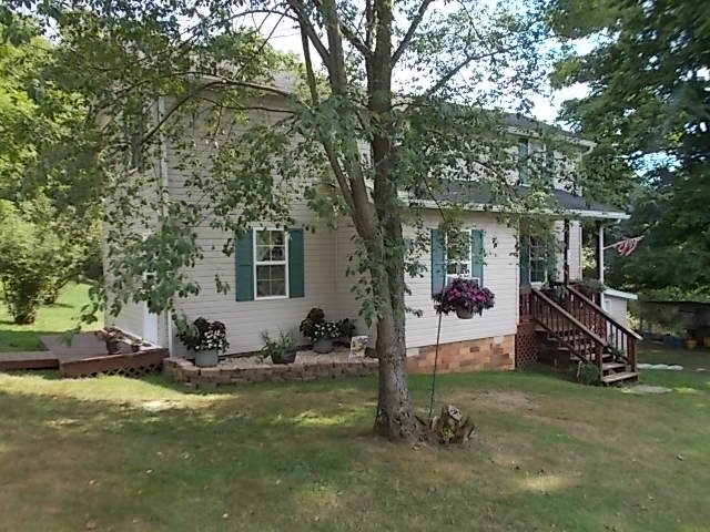 720 Grove Street Emlenton, PA 16373 - Photo 2 of 18 a view of a house with backyard