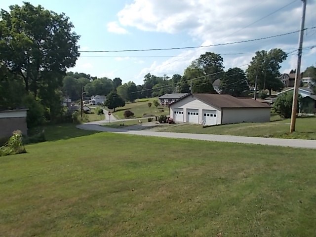 720 Grove Street Emlenton, PA 16373 - Photo 6 of 18 a view of a house with a yard