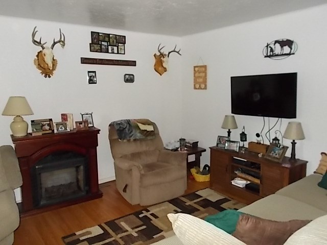 720 Grove Street Emlenton, PA 16373 - Photo 10 of 18 a living room with furniture and a flat screen tv