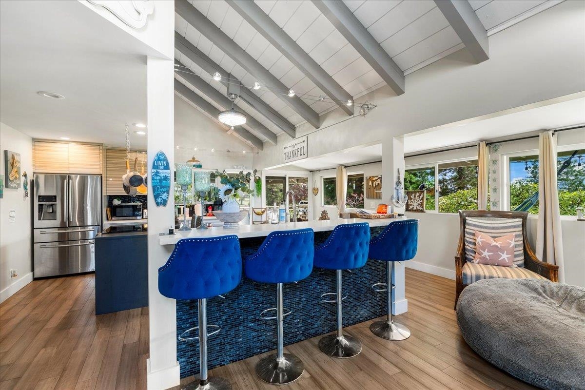2861 Liholani Street Makawao, HI 96768 - Photo 13 of 42 a view of a dining room with furniture window and wooden floor