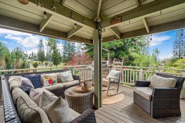 a balcony with furniture