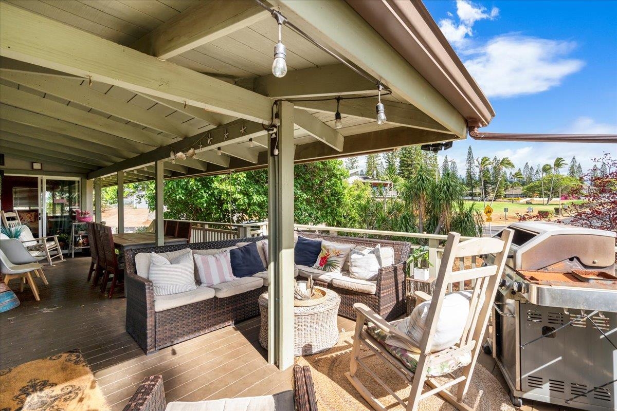 2861 Liholani Street Makawao, HI 96768 - Photo 19 of 42 a view of a patio with chairs and table under an umbrella