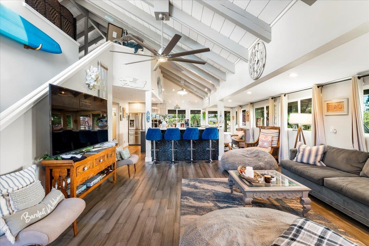 2861 Liholani Street Makawao, HI 96768 - Photo 3 of 42 a living room with furniture and a flat screen tv