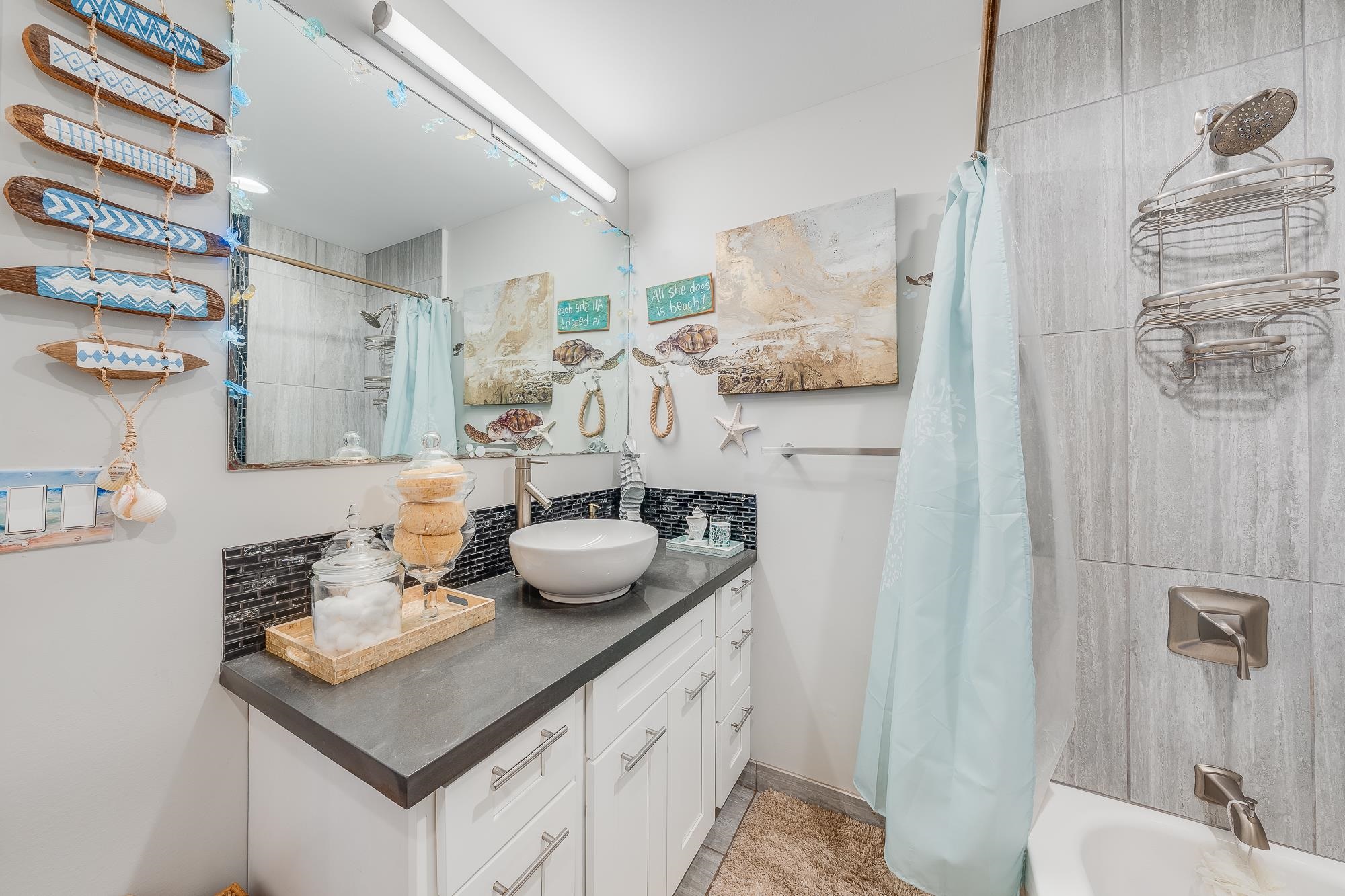 2861 Liholani Street Makawao, HI 96768 - Photo 38 of 42 a room with a sink and a table with chairs