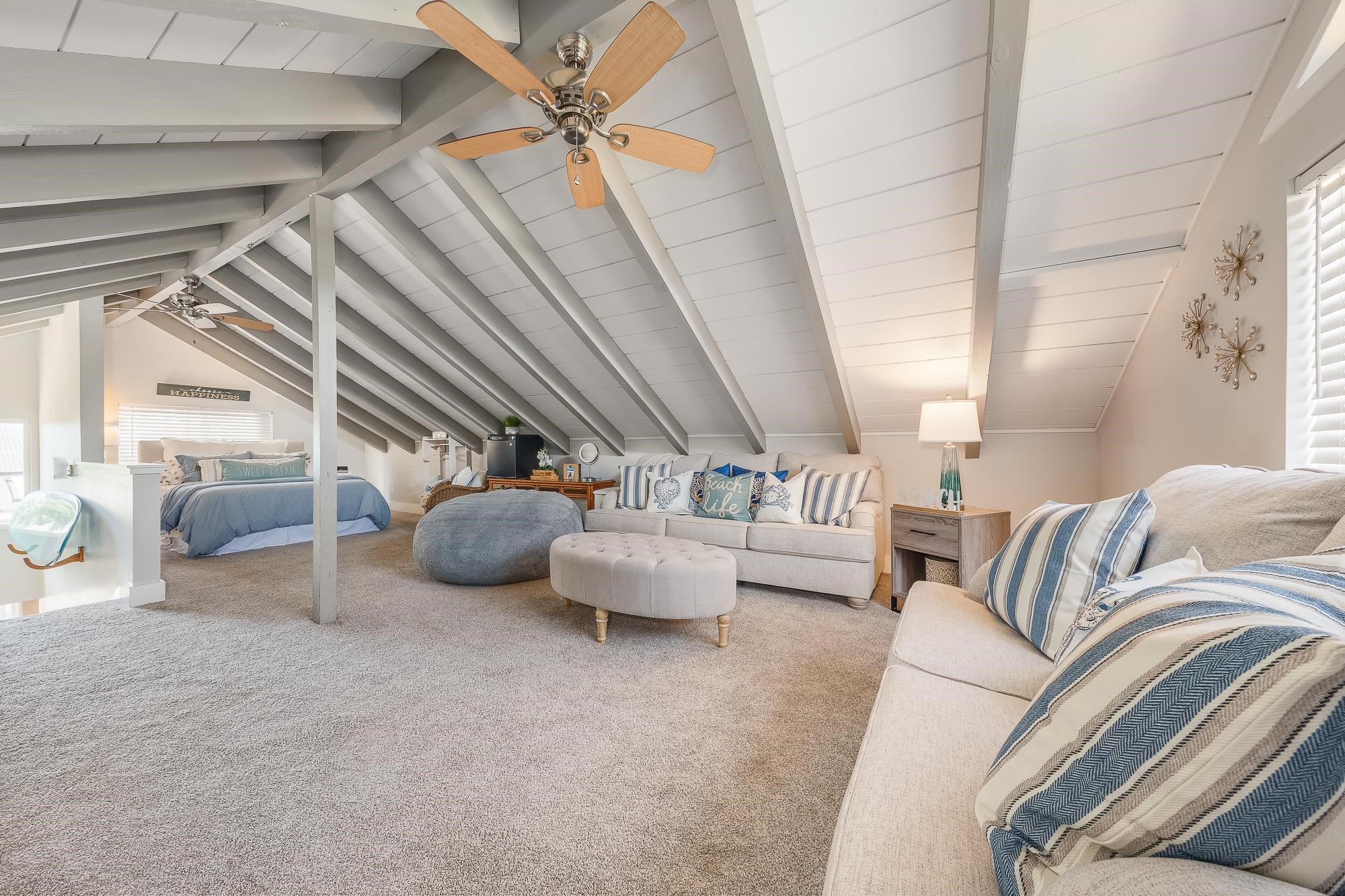 2861 Liholani Street Makawao, HI 96768 - Photo 42 of 42 a living room with furniture and a chandelier