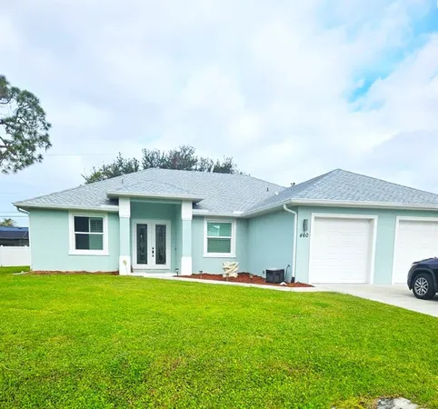 a front view of house with yard and porch