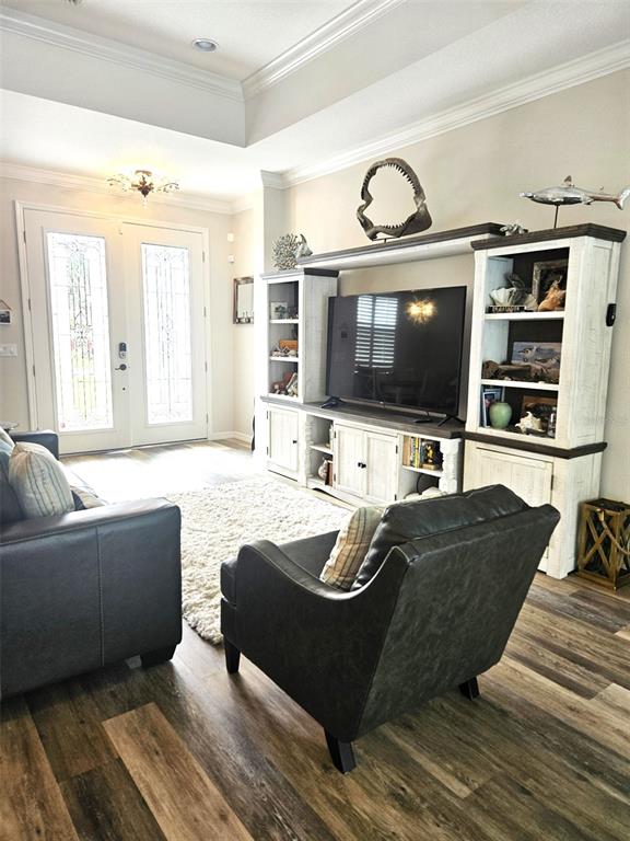 460 Marlin Road Venice, FL 34293 - Photo 12 of 44 a living room with furniture and a flat screen tv