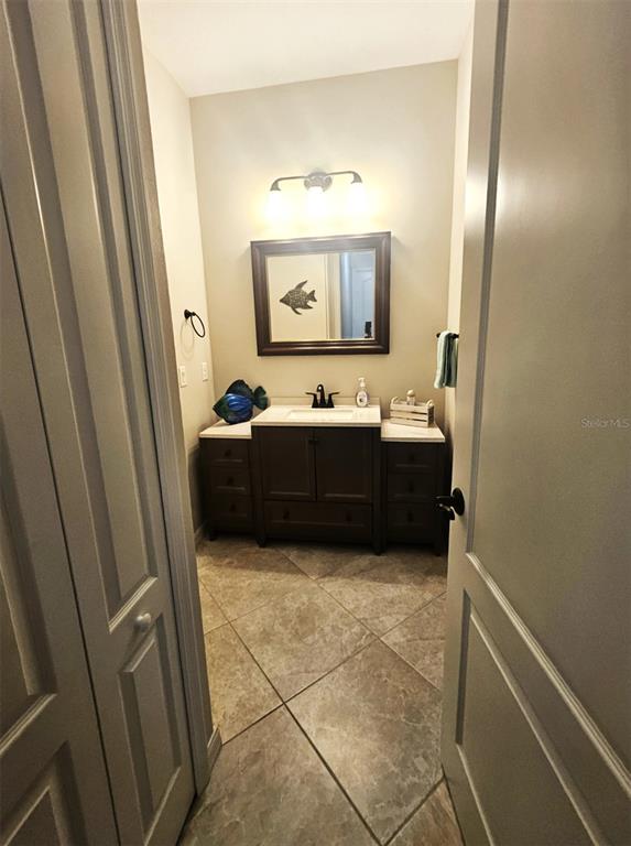 460 Marlin Road Venice, FL 34293 - Photo 20 of 44 a bathroom with sink and mirror