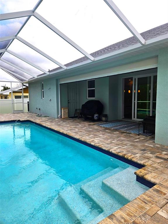 460 Marlin Road Venice, FL 34293 - Photo 2 of 44 a view of a house with swimming pool