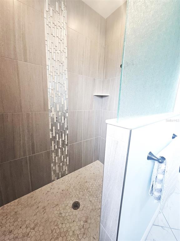 460 Marlin Road Venice, FL 34293 - Photo 34 of 44 a bathroom with a shower