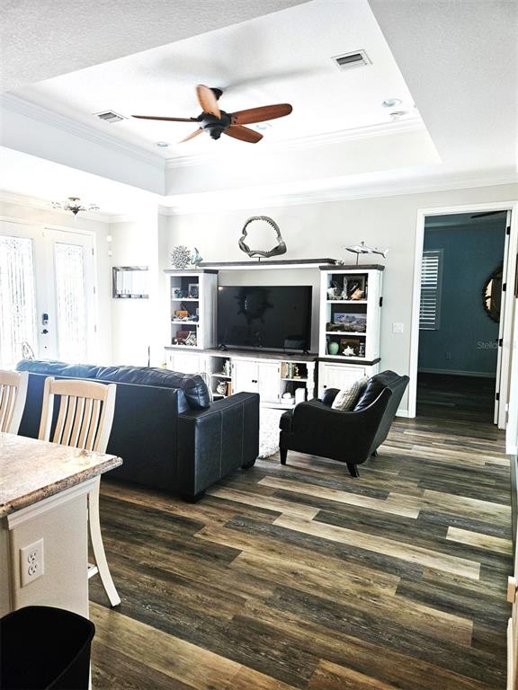 460 Marlin Road Venice, FL 34293 - Photo 9 of 44 a living room with furniture and a flat screen tv
