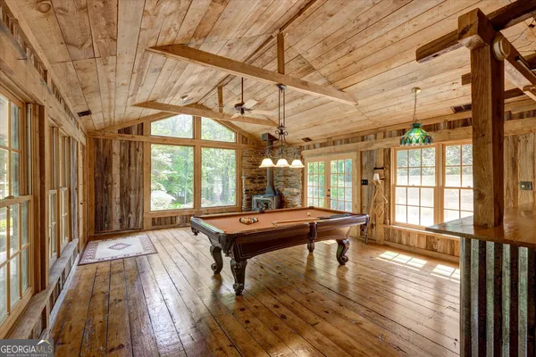 a dining room with large window