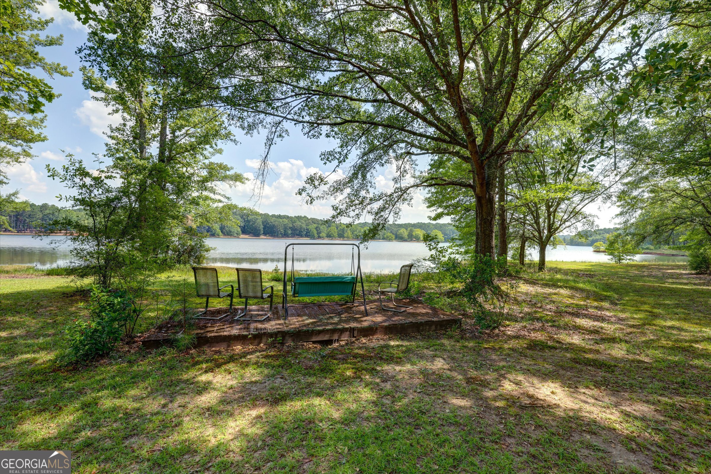 424 Hampton Road Hampton, GA 30228 - Photo 38 of 44 a view of a house with a yard