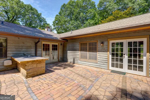 a backyard of a house with seating space