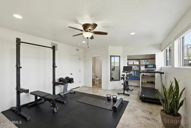 a bedroom with a bed and furniture