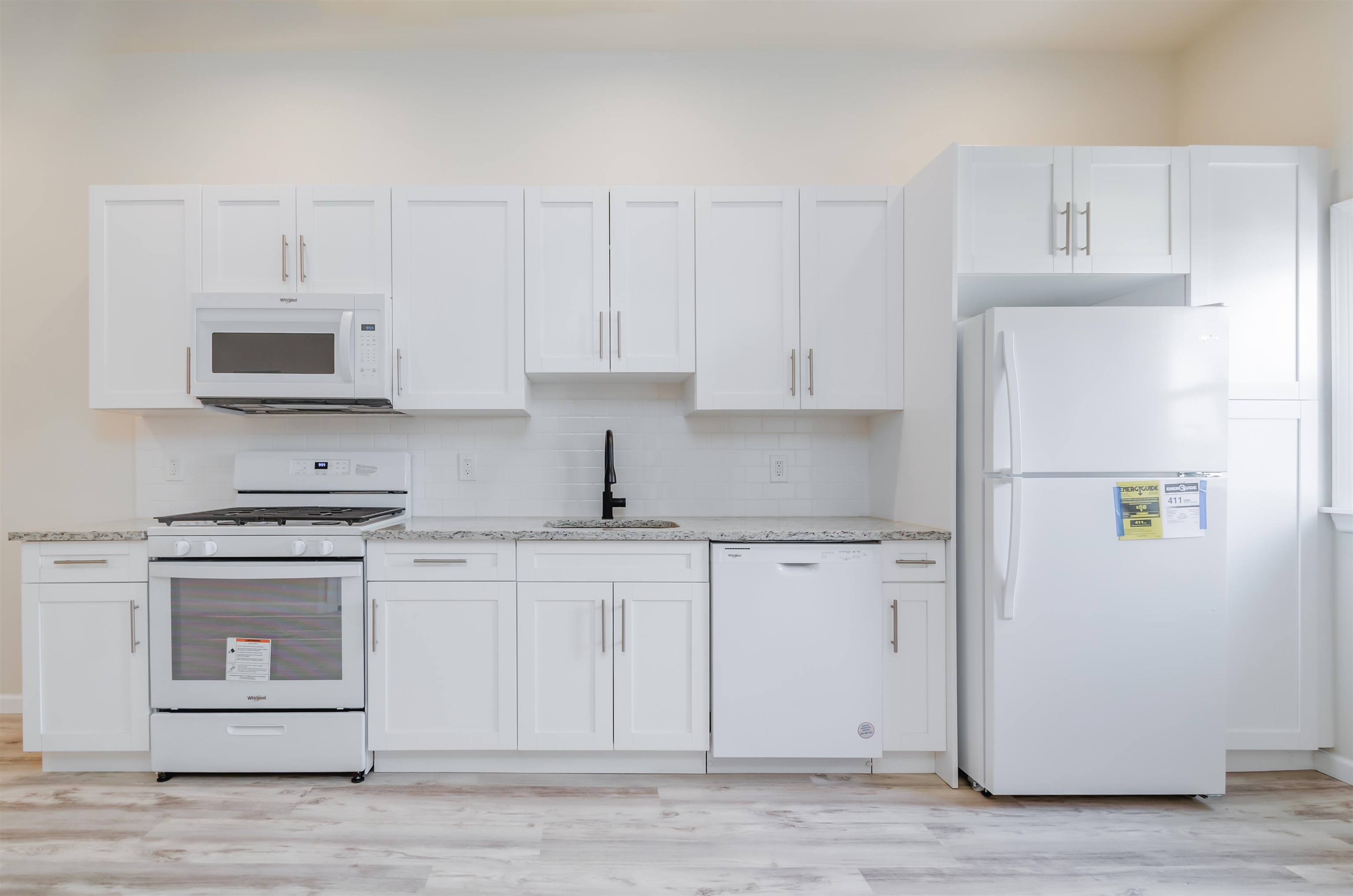 419 22nd Street, Unit 3 Union City, NJ 07087 - Photo 7 of 11 a kitchen with cabinets appliances and a counter space