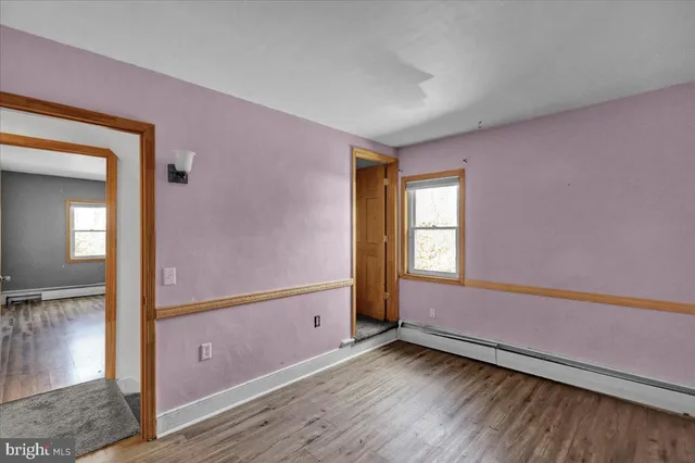 a view of an empty room and window