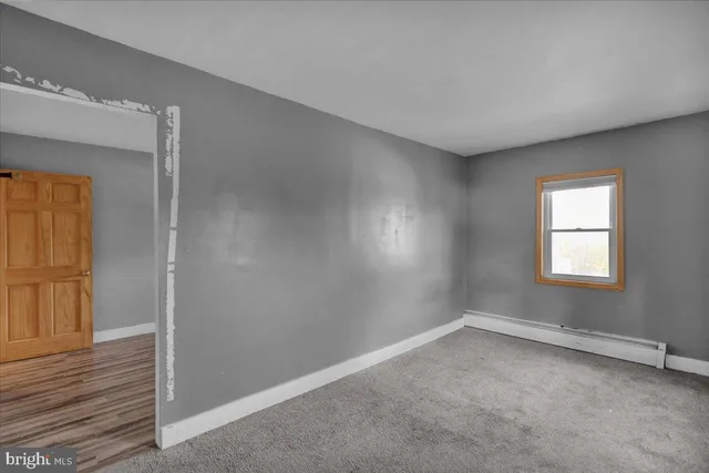 an empty room with a window