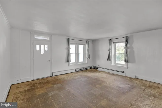 an empty room with windows