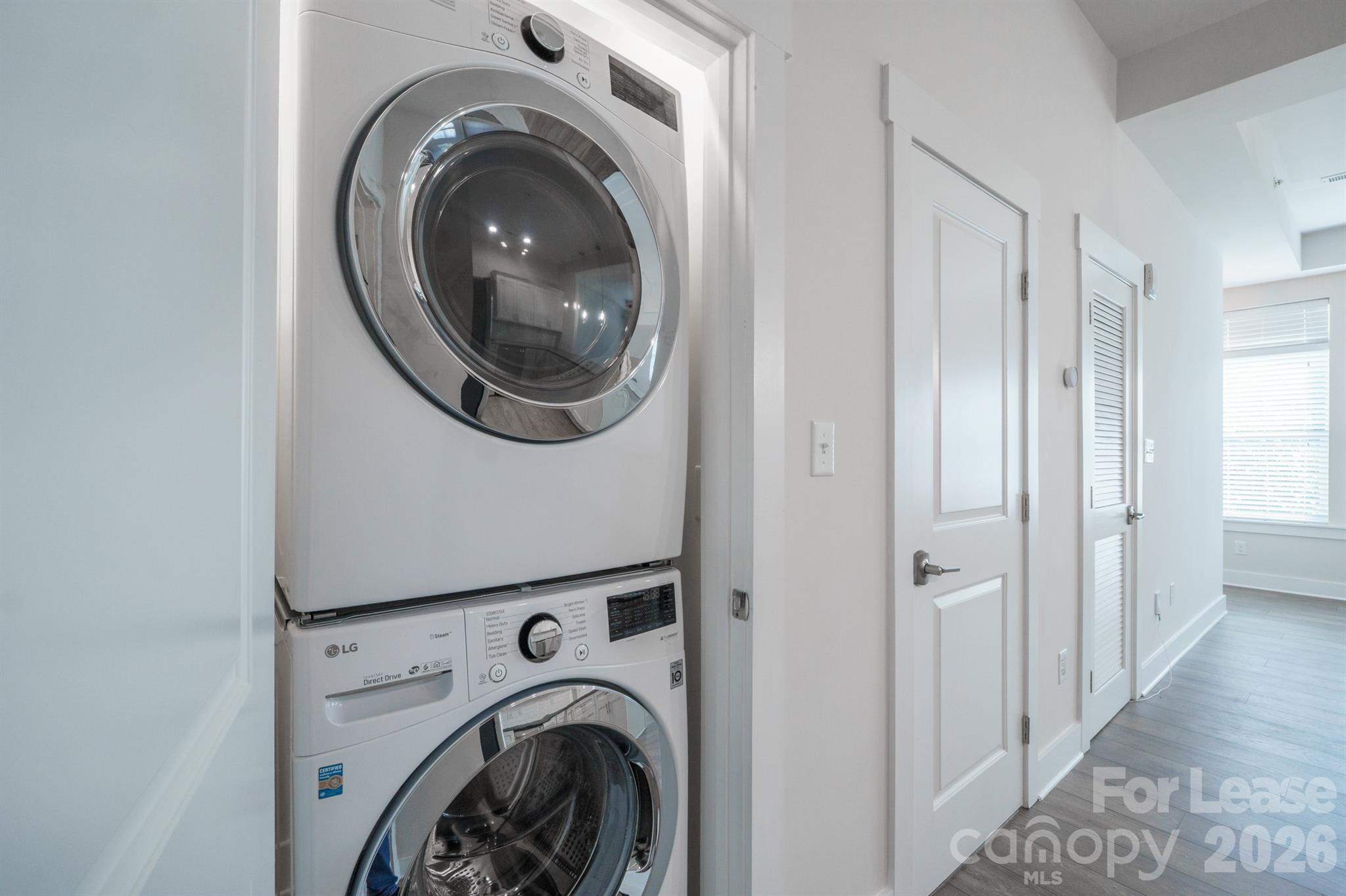 935 McAlway Road Charlotte, NC 28211 - Photo 13 of 21 a view of a hallway with washer and dryer
