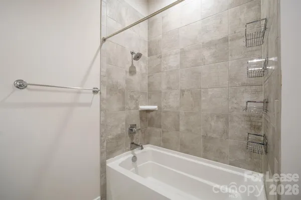 a close view of a bathtub in bathroom