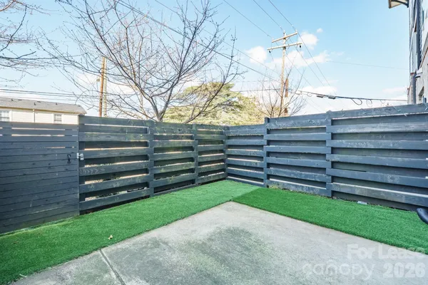 a view of house with backyard and outdoor space